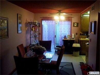 SPACIOUS LIVING AREA ADJACENT TO STEP SAVER KITCHE