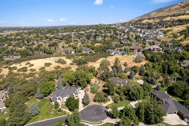 Aerial view of property's location featuring nearby suburban area