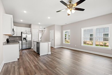 Kitchen featuring plenty of natural light, an isla