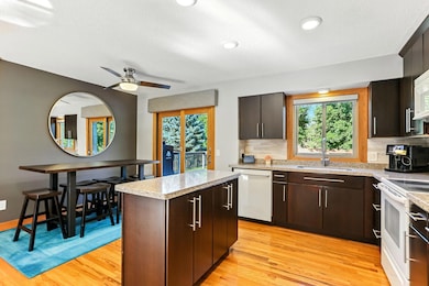 Enjoy the open kitchen featuring center island.