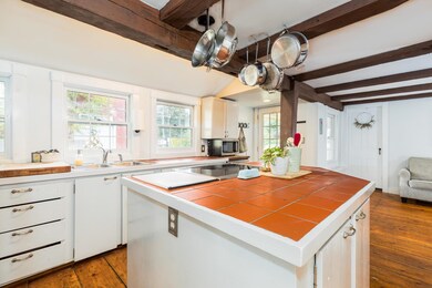 Covered Porch door access direct to Kitchen/Family area