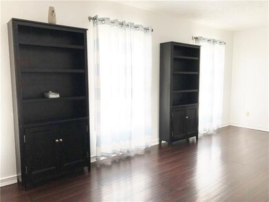 Living room with gorgeous cabinetry.