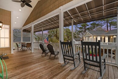 Deck at dusk featuring ceiling fan