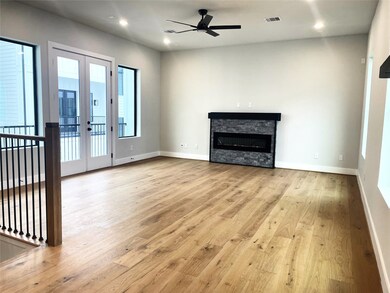 BLACK accent electrical fireplace. The light color