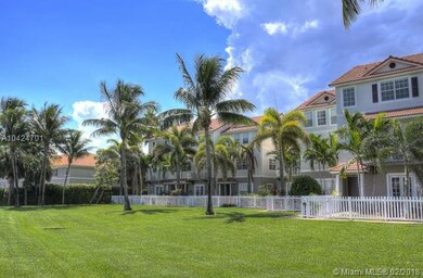 Townhouse row on water and park grounds