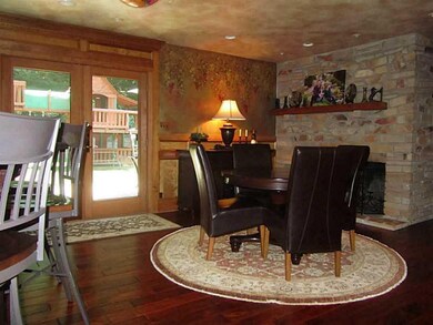 Great Room. Pub area with wide plank teak floor an