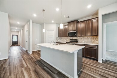 Kitchen with pendant lighting over the island