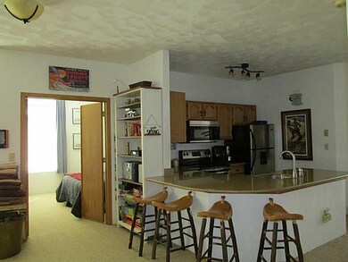 Kitchen. The granite counter was extended for a br