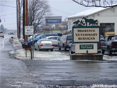 Land/Lot Neighboring business including Super Walm