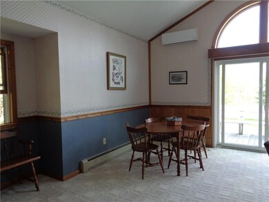 Dining area and door to front deck.