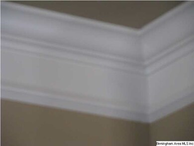 Look at the crown molding on these 9 ft ceilings -