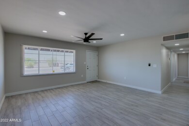 LIVING ROOM WITH MODERN TILE