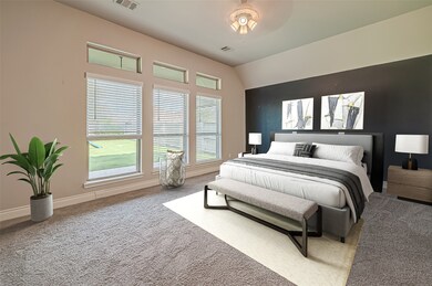1st floor primary bedroom beautiful natural light