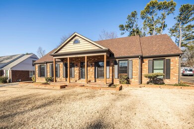 View of front of property with a front lawn and a 