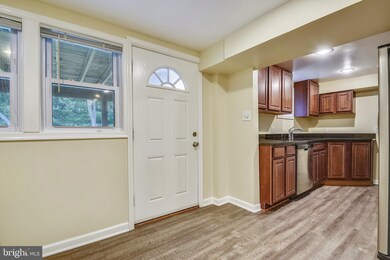 128 Greenmeadow Dr unit T, Lutherville Timonium, MD 21093 - photo 2