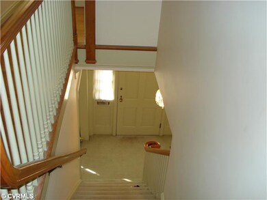 Foyer - entrance foyer with wood floors under carp