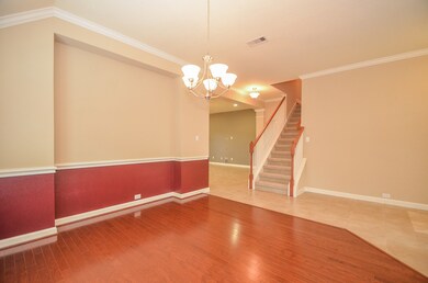 The dining area flows naturally from the entry and has ample dining space that is ideal for family gatherings and holiday celebrations