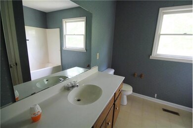 Hall Bath just down from the kitchen.