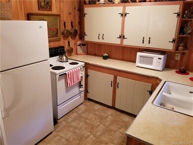 Kitchen is Well Equipped and has a bright nature t