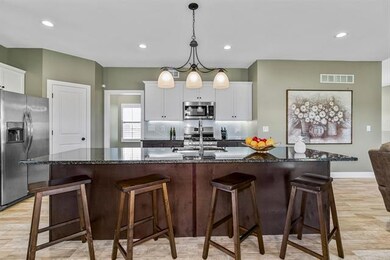 720 Gamma Grass Place, Raymore, MO 64083 - photo 6