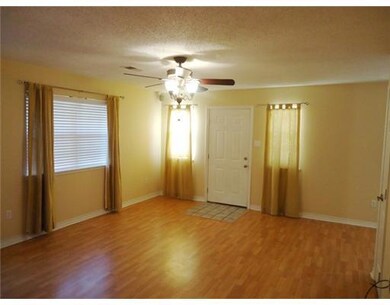 Den/Family/Great Room. Laminated wood flooring, fr