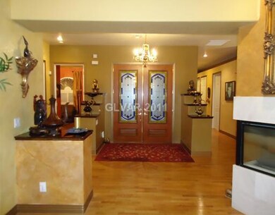 Property Photo. Double doors by front foyer