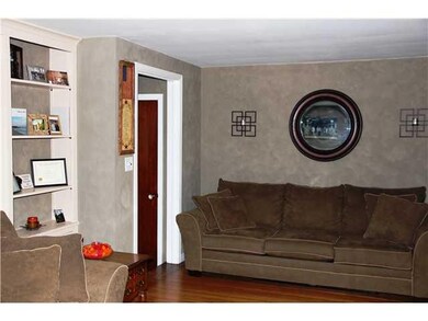 Living Room. Wood floor and front foyer with close