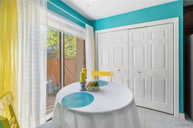 Sunny eat-in kitchen with roller shade