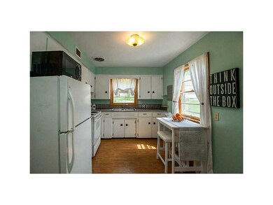 Eat-in Kitchen. Newer counter tops and flooring in