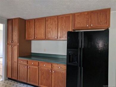 Plenty of storage in this large kitchen with pantr