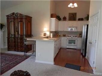 Kitchen open to great room and dinette area.