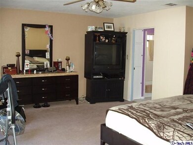 Master bedroom as you enter.