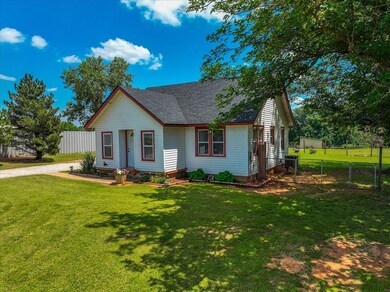 Bungalow with a front lawn