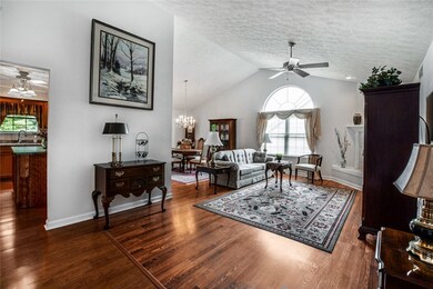 The open floor plan is inviting--wonderful for entertaining or easy living. The cathedral ceiling adds to the feeling of light and space