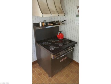 In the kitchen there is a 6 burner South Bend comm