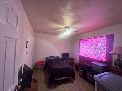 Bedroom featuring hardwood / wood-style floors and