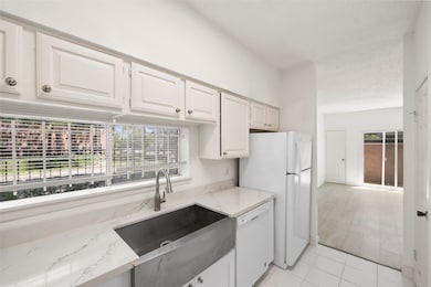 Modern kitchen featuring nearly new appliances.
