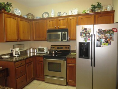 Includes granite, tile, stainless steel appliances