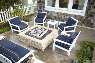 Gas fire pit area ideal for year round entertainin