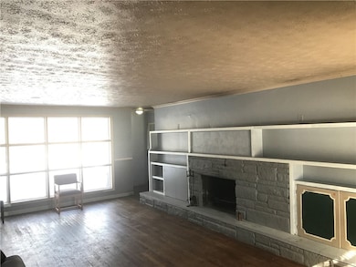 Living room, window overlooks deck.