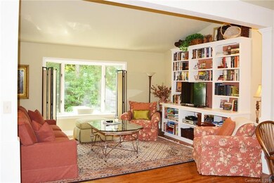 Great Room with Custom Bookcases and Bay Window