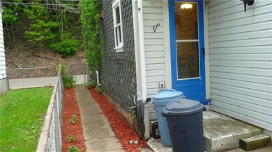 Side view and backdoor to 2326 Spring Garden Ave.
