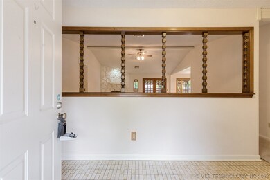 Large Entryway separates living room and offers a