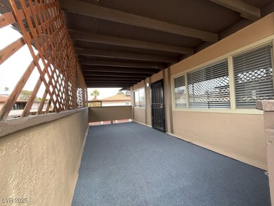 View of patio / terrace with a balcony