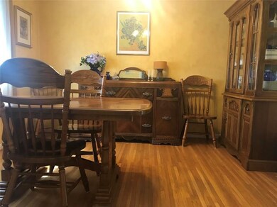 Dining room off of kitchen has true hardwood floor
