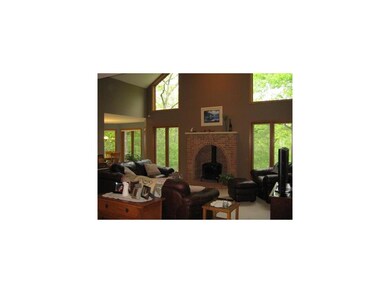 Den/Study. Vaulted great room that is open to the 