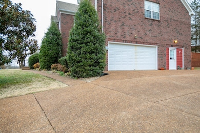 Double width driveway creates tons of parking space.