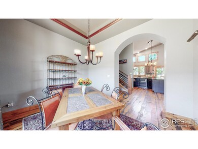 Arched doorway enters kitchen