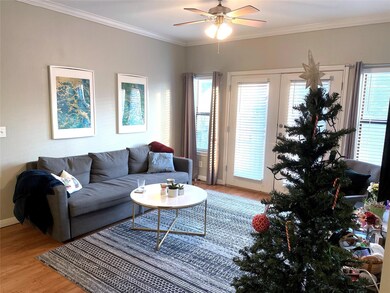 Living room featuring a healthy amount of sunligh