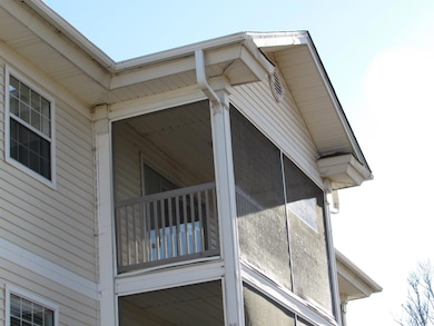 Exterior photo of screen porch.